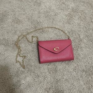 Pink and gold coach crossbody